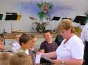 Pani učiteľka Mgr. Komová so svojimi recitátormi Pani učiteľka Mgr. Komová so svojimi recitátormi